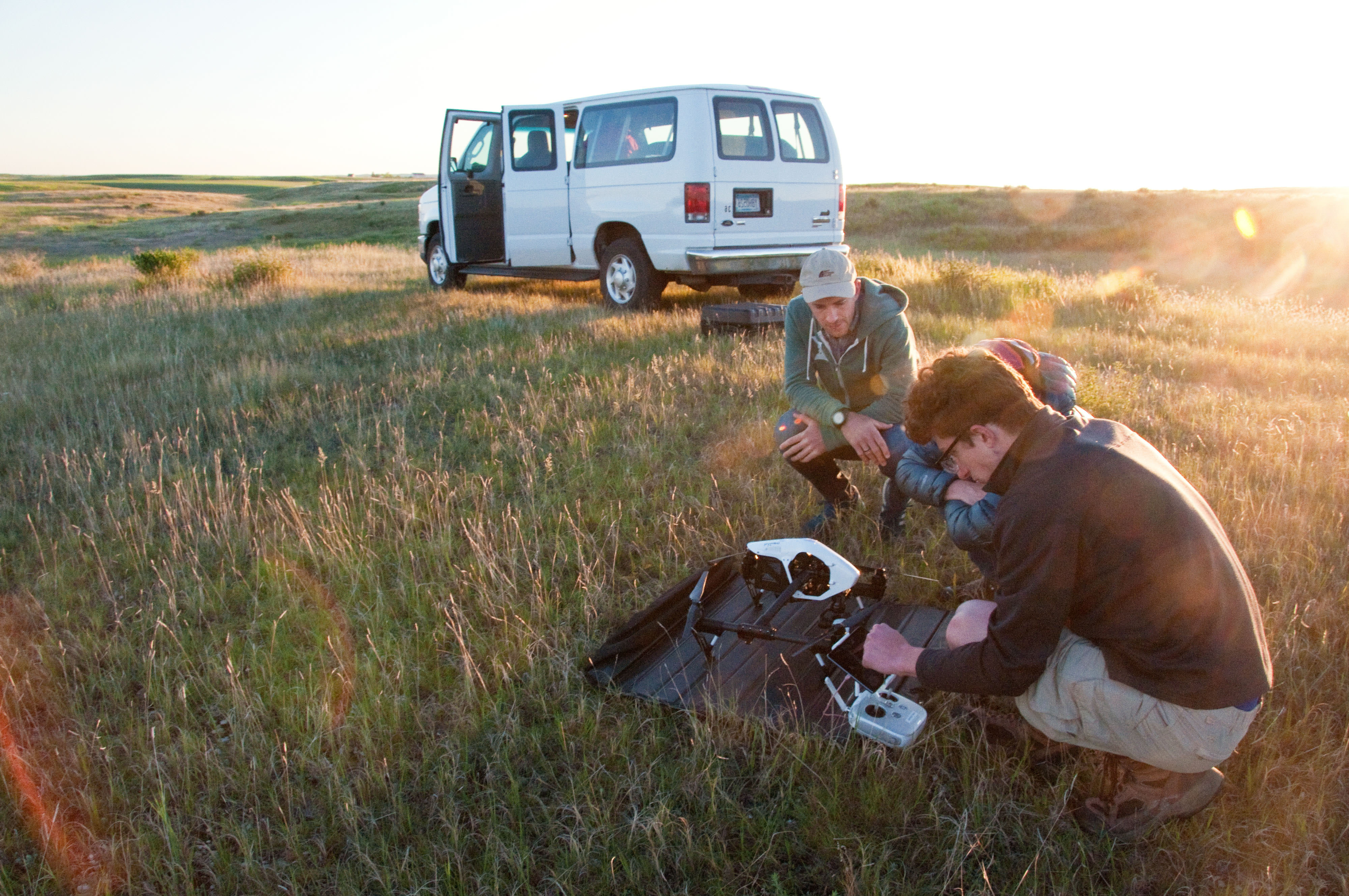 Students prep a drone for a research flight