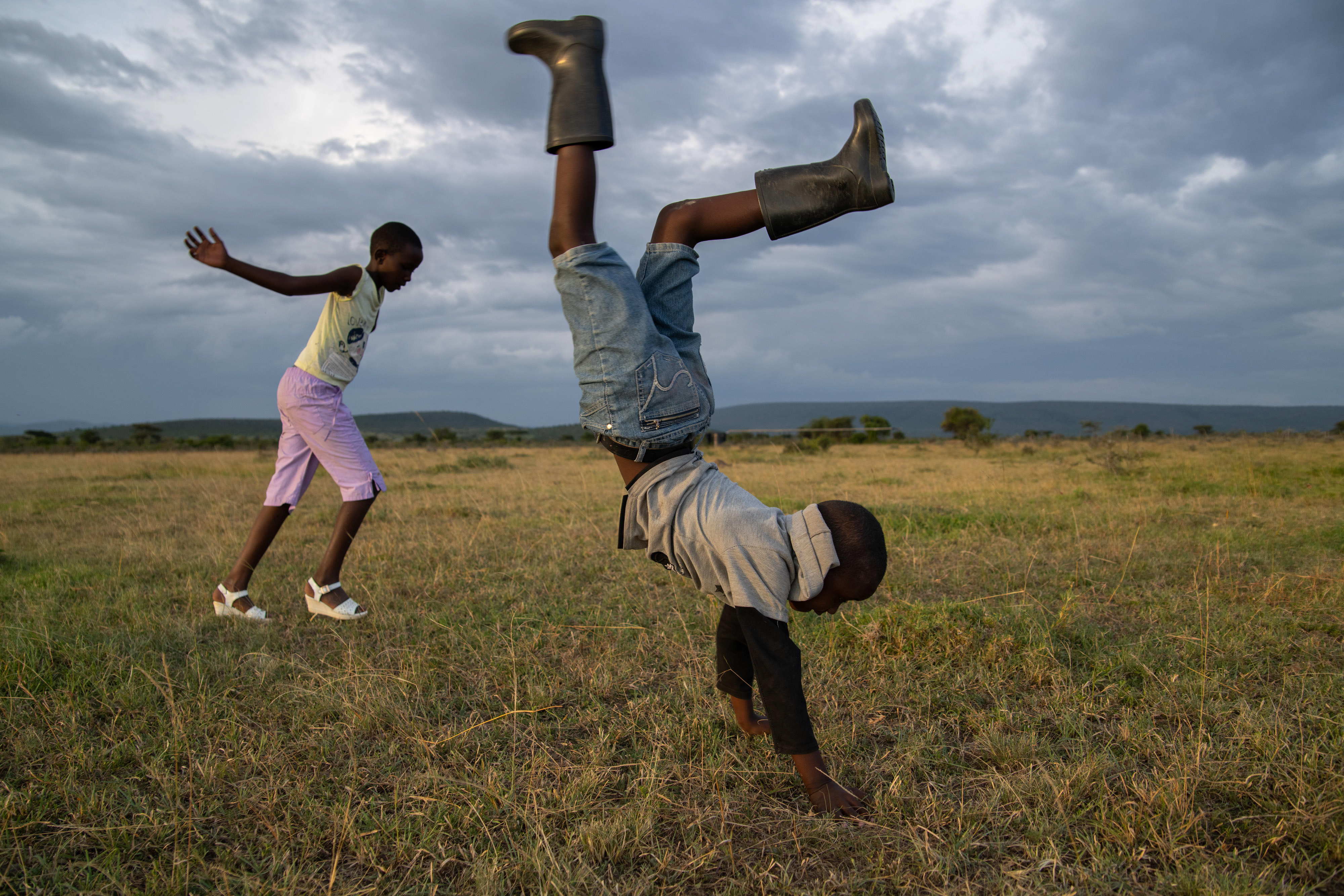 Children playing in grass