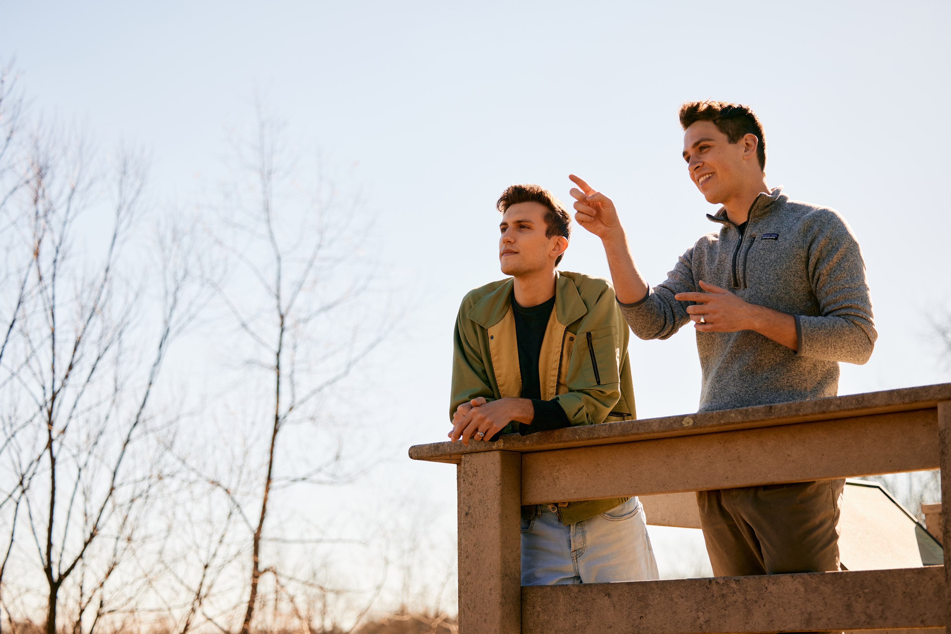 Chad Duplain stands on bridge with partner Matthew at Big Darby Headwaters Nature Preserve.