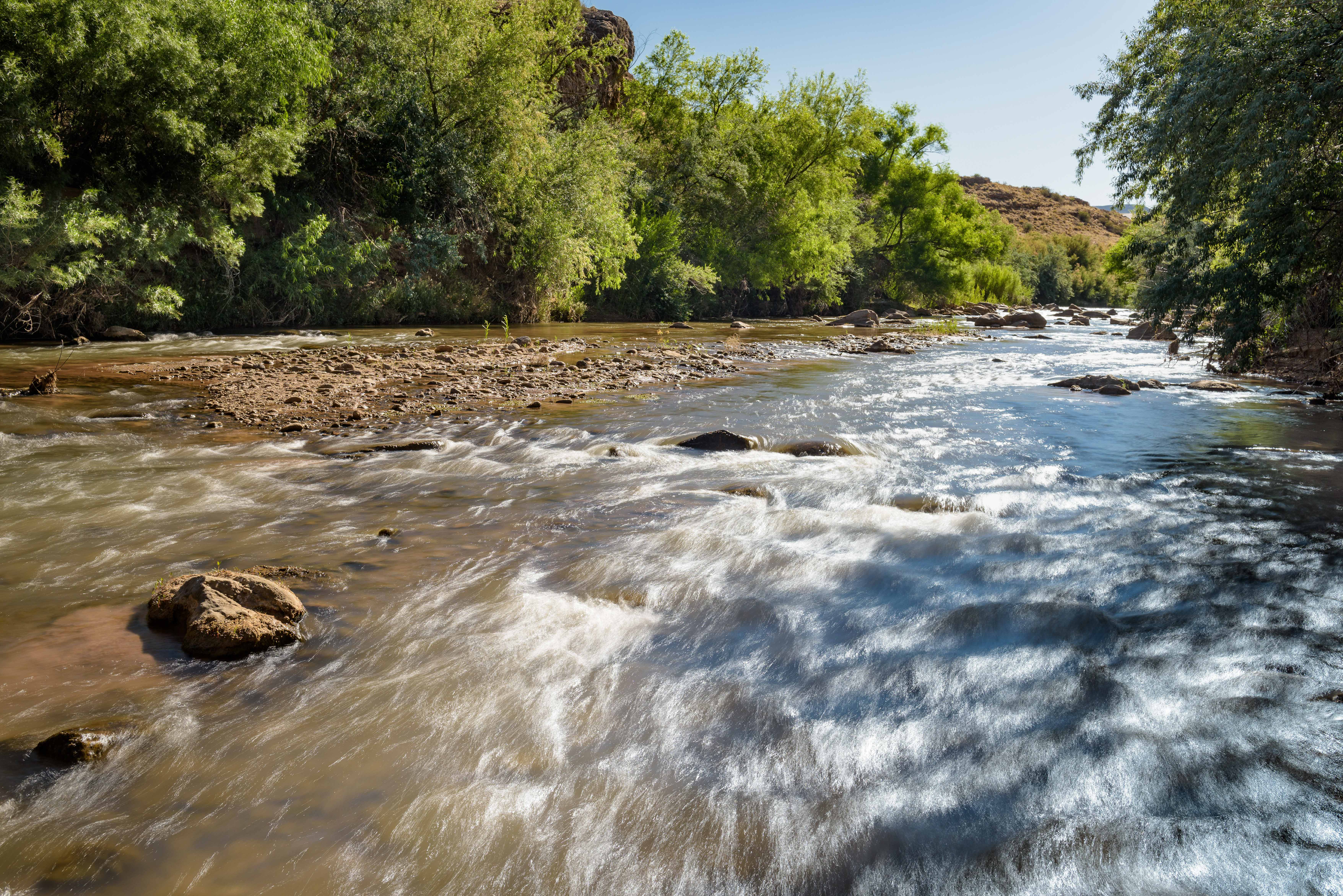 A close-up of the rushing waters of the Virgin River at the Sheep Bridge Preserve.