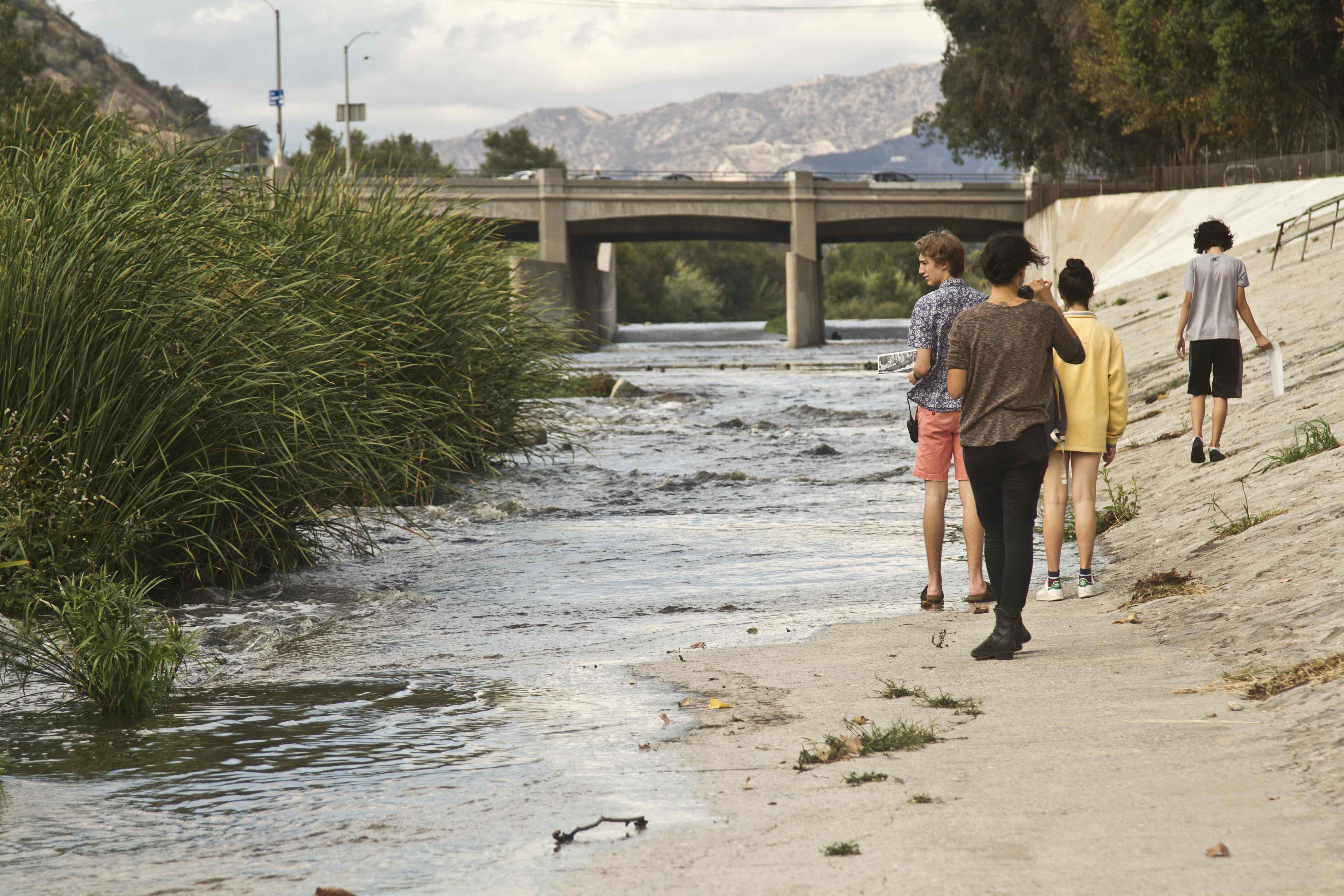 Walking along an urban river.