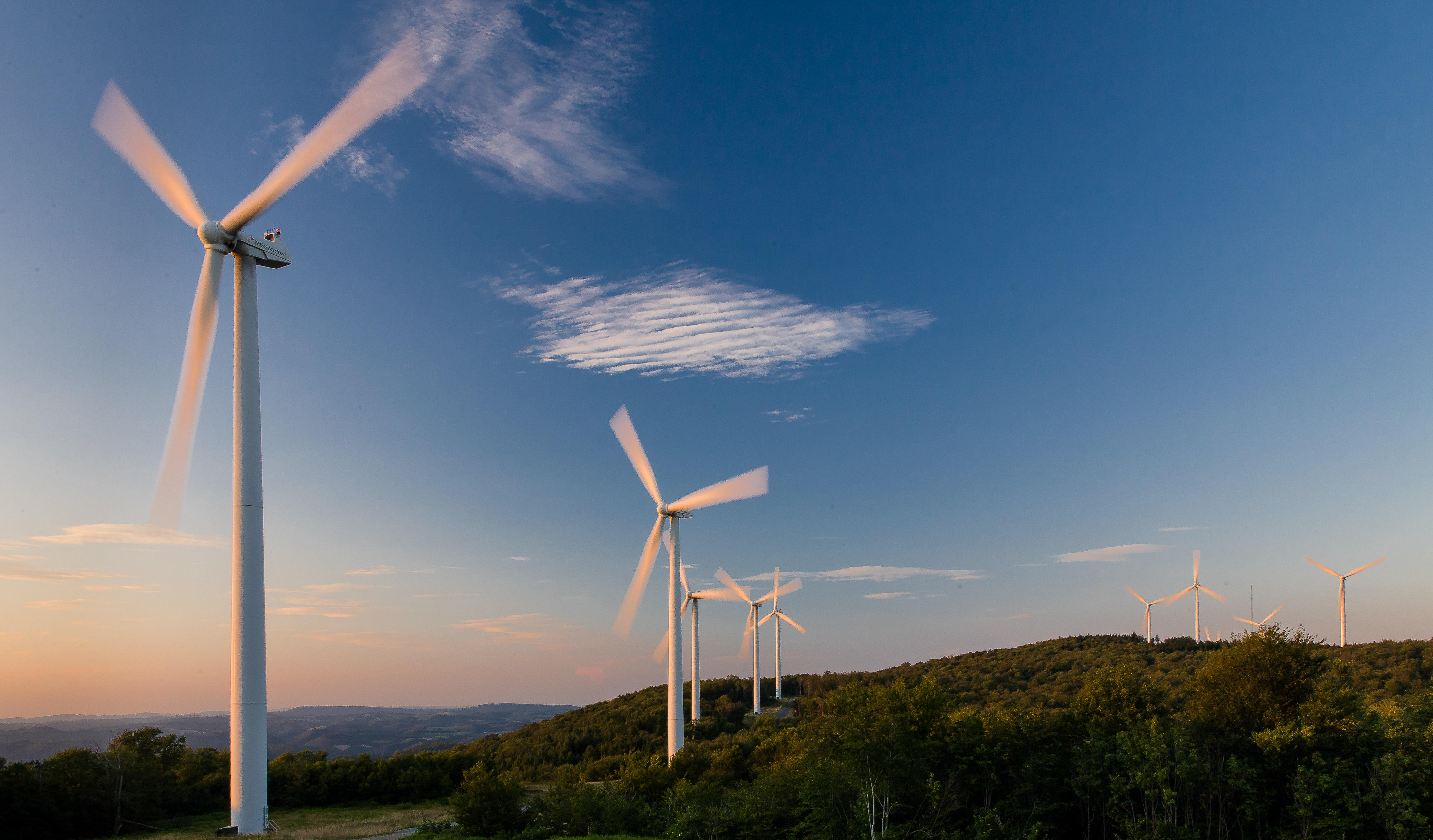 Wind farm turbines situated on a ridge top in the Appalachian mountains of West Virginia.
