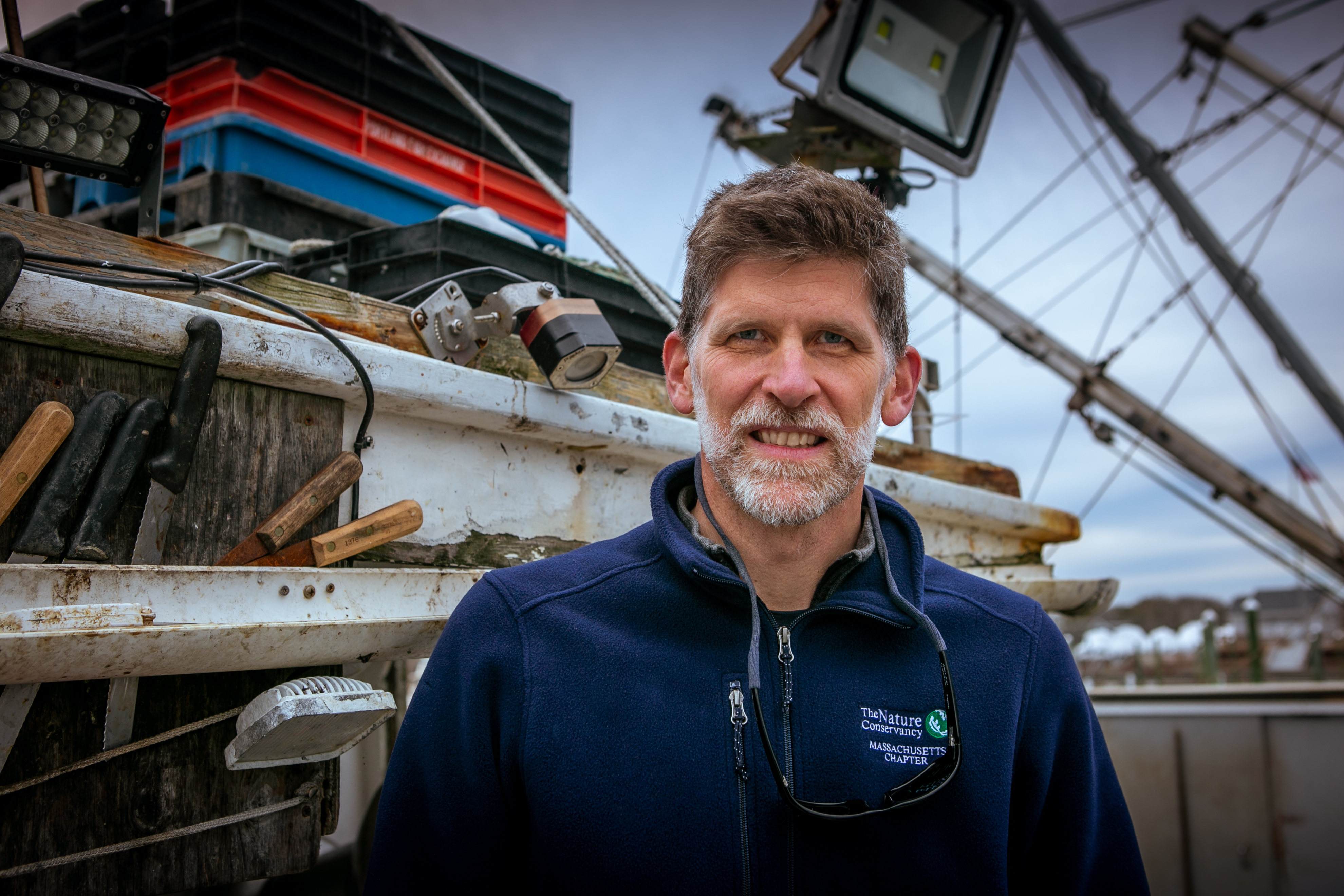 Close up of Chris McGuire on a fishing boat.