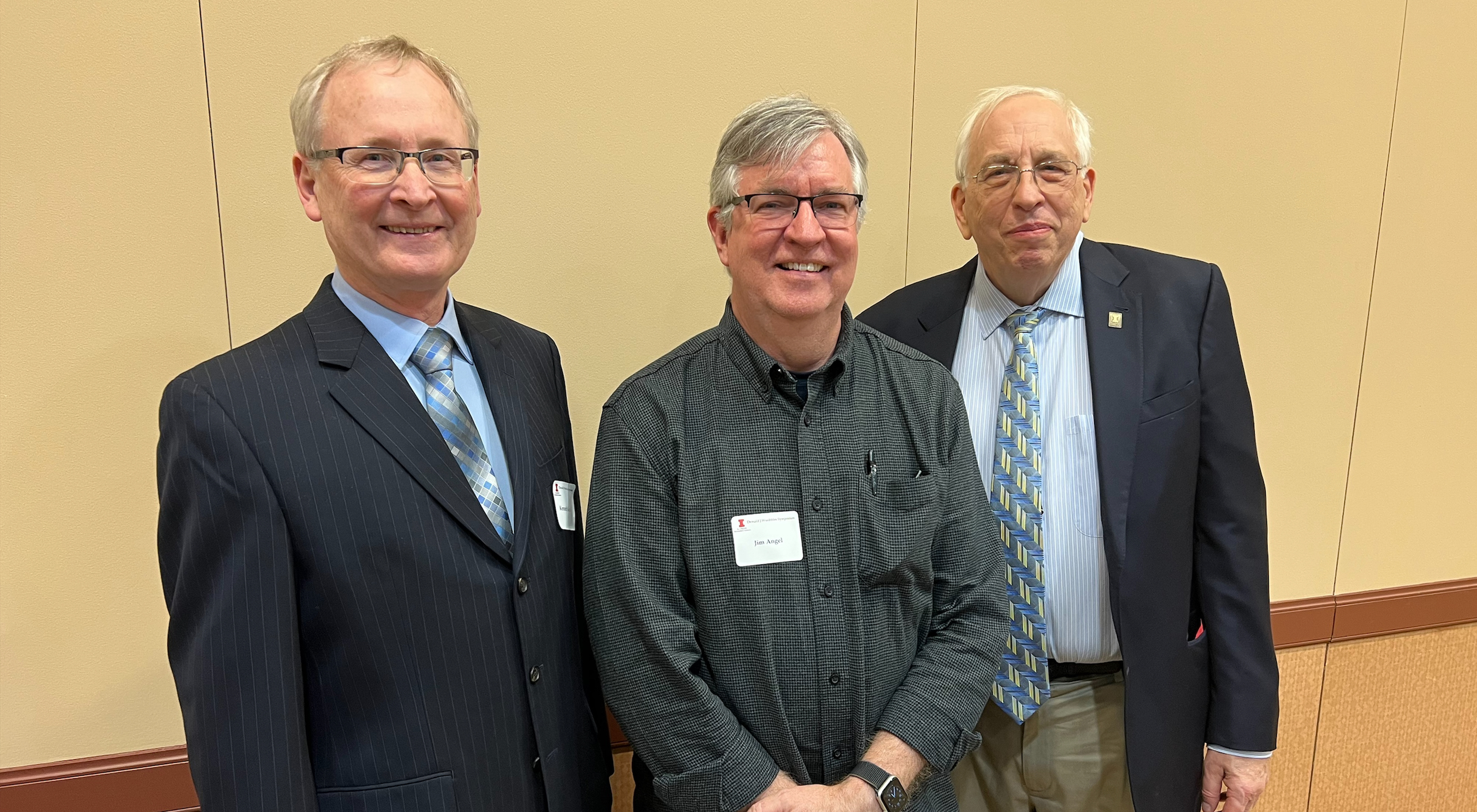Ken Kunkel, Jim Angel, and Don Wuebbles pose for a photo. 