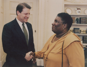 Hazel Johnson shakes the hand of US Vice President Al Gore at the White House.