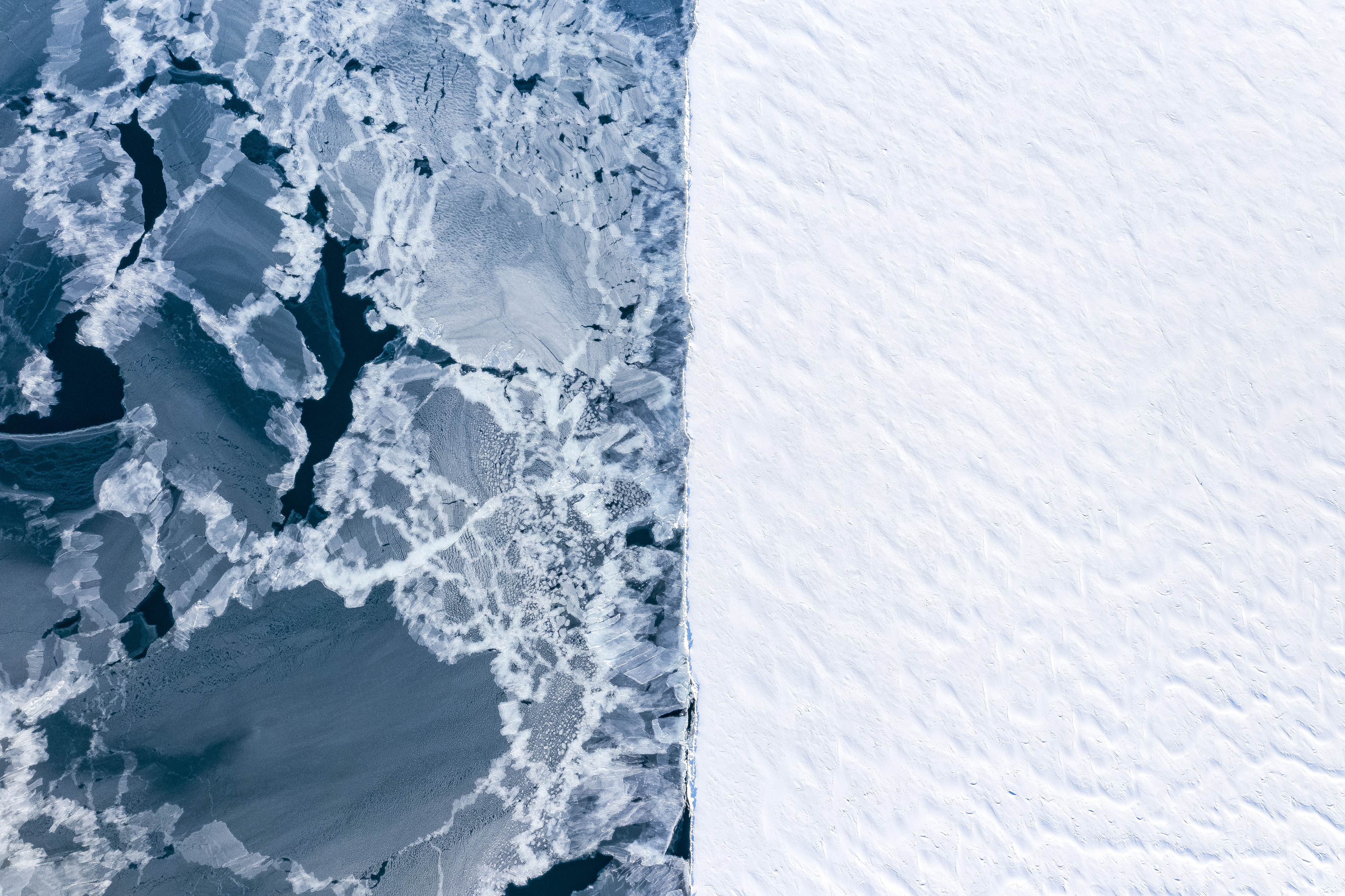 Aerial view of frozen water and solid ice.