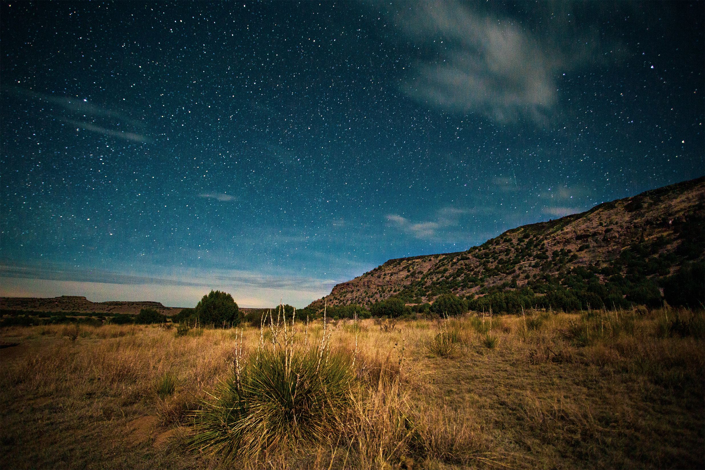 Under the emerging stars as the sunsets at Black Mesa State Park and Nature Preserve.