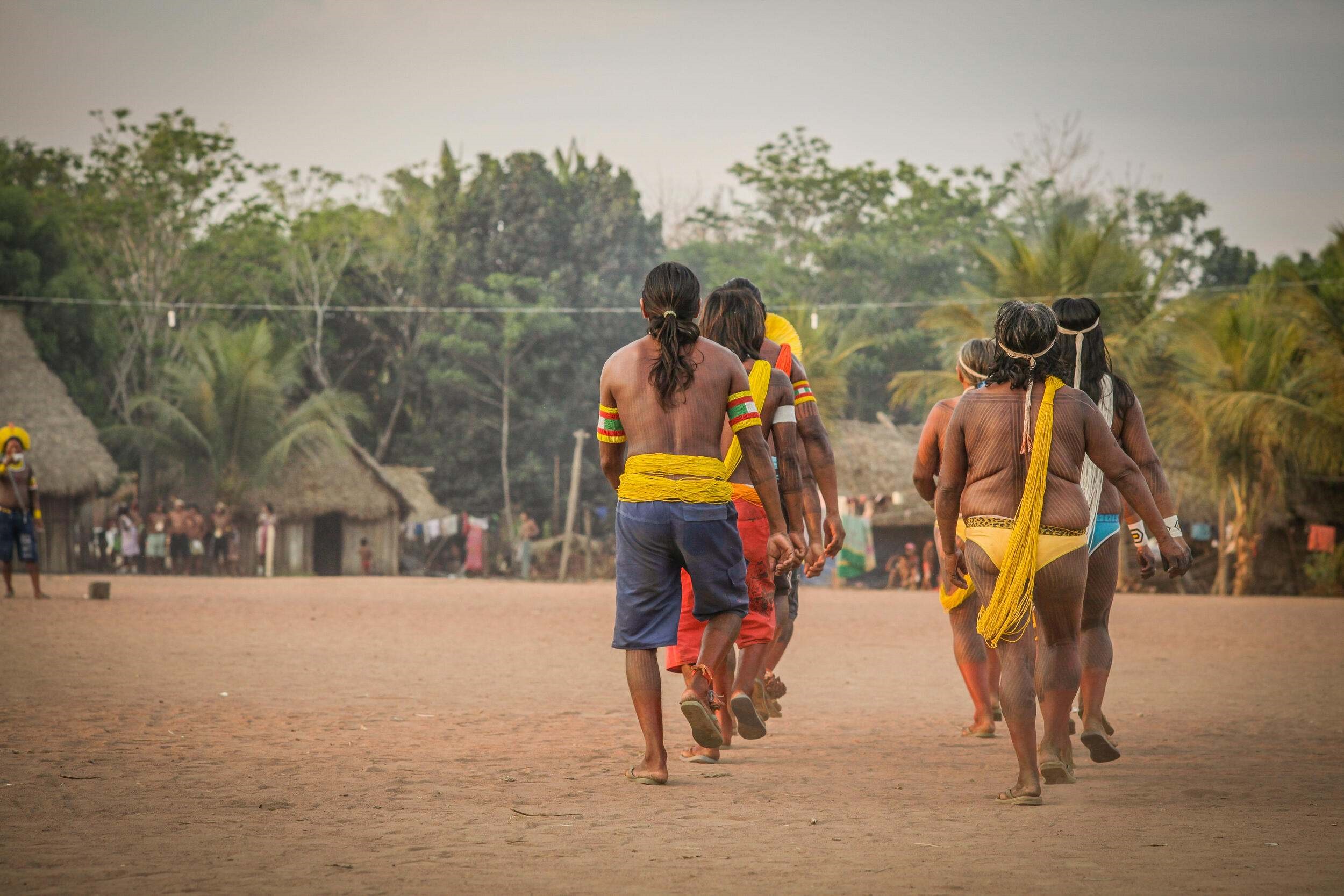 Photo of indigenous people walking.