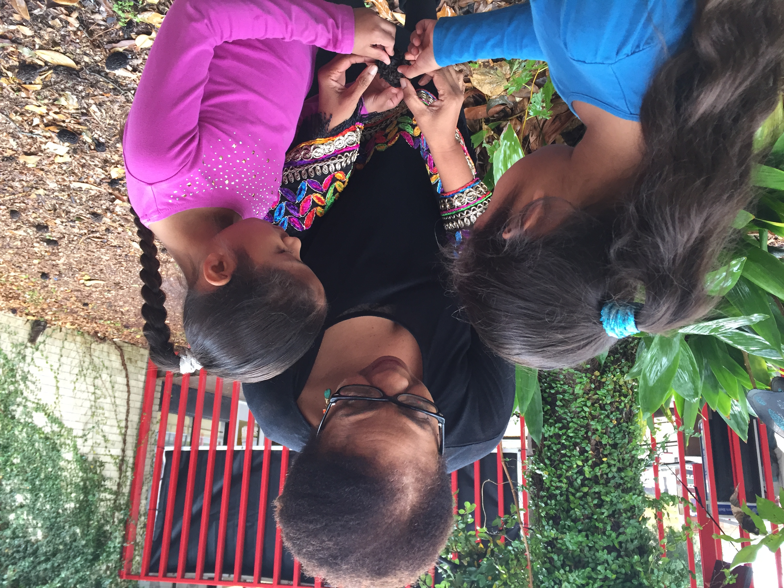 Dr. Mamie Parker with two students in Houston. 