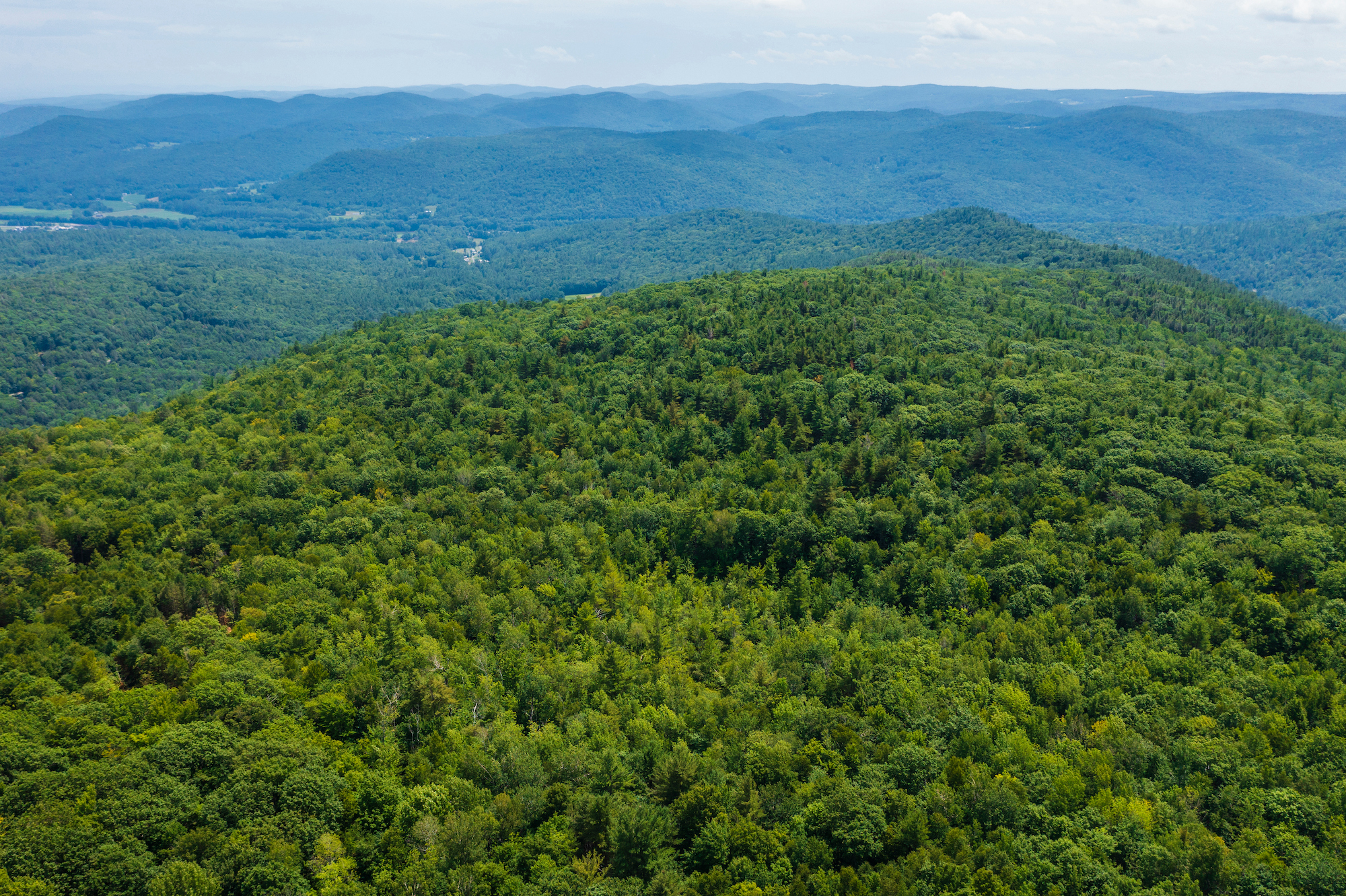 Aerial view of forested mountains in Western Massachusetts