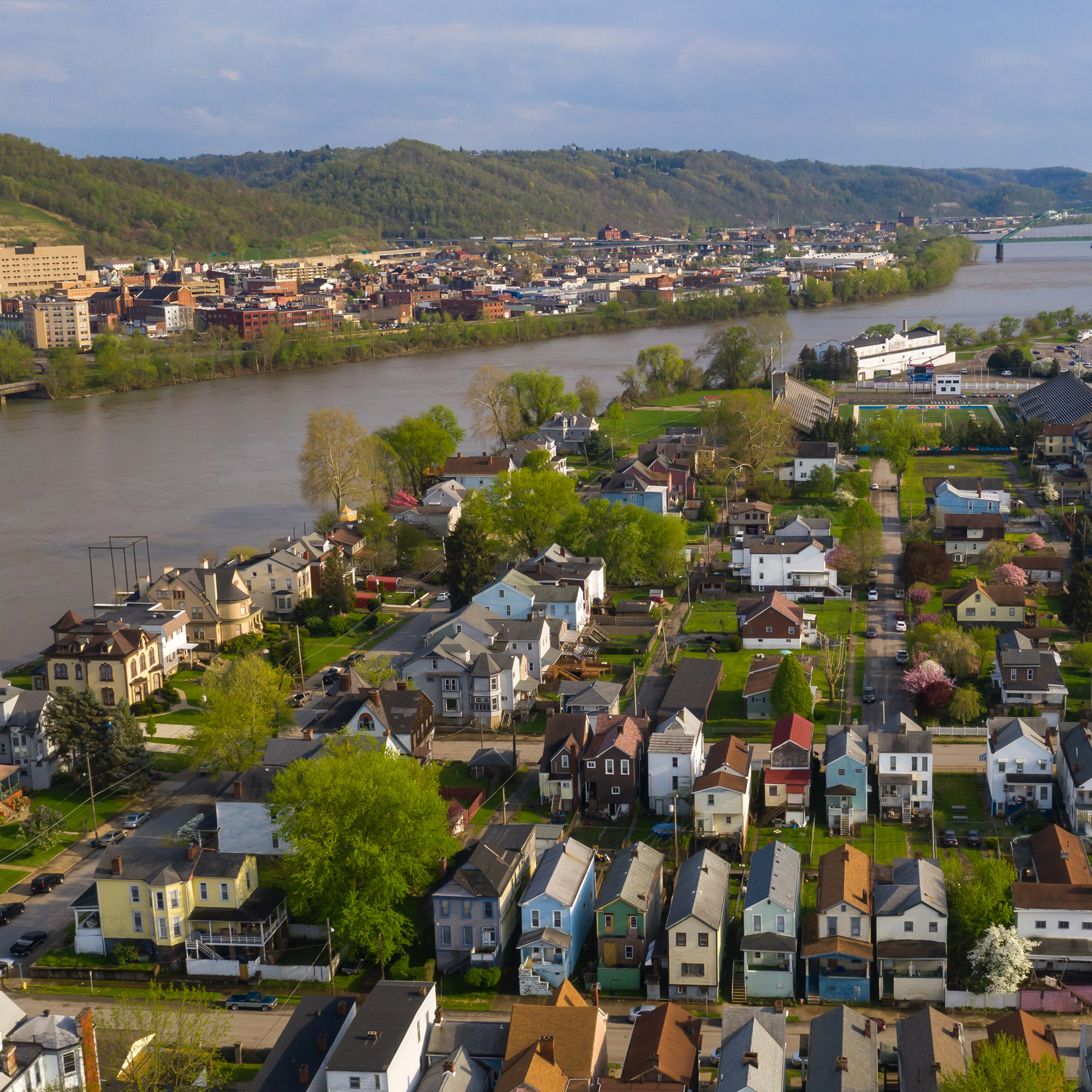 aerial view of west virginia town along a river