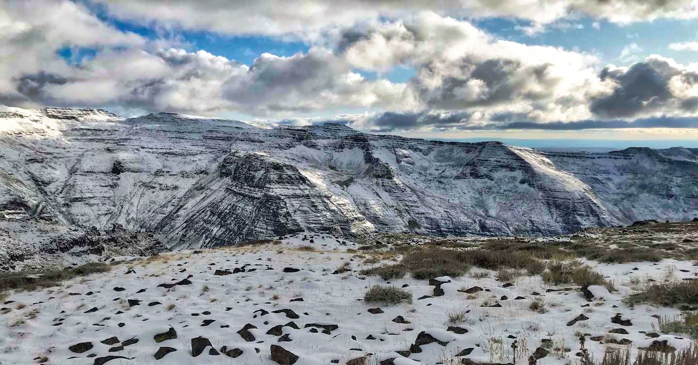 Varying amounts of snowfall on Steens Loop Road on the way up to Kiger Gorge.