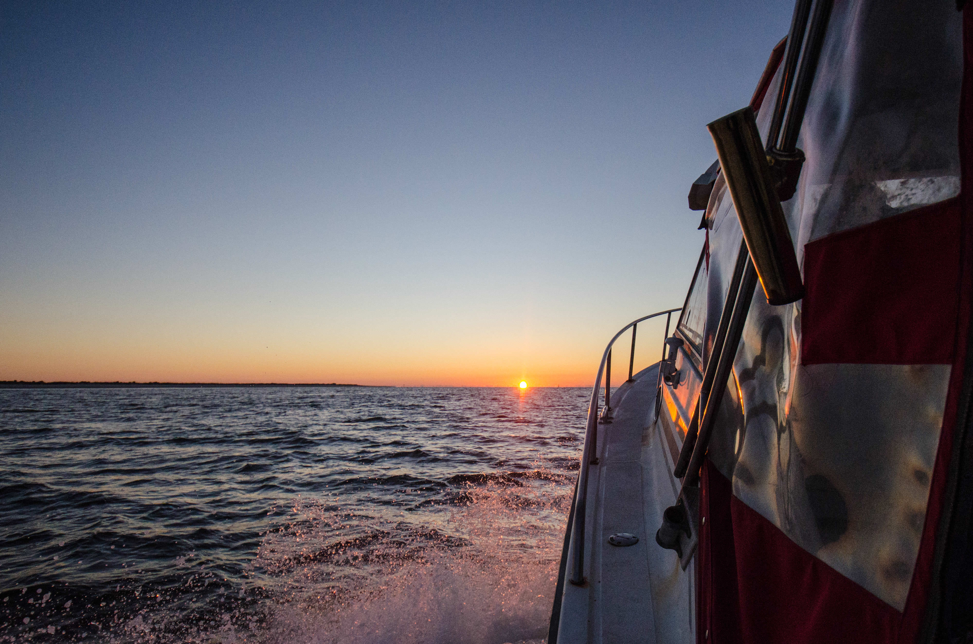 sunrise seen from fishing boat